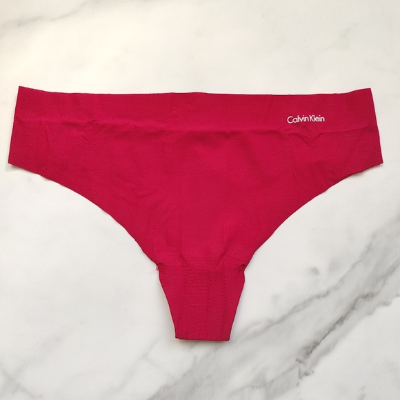 NWOT CALVIN KLEIN INVISIBLES THONG PANTY IN PERSIAN RED SIZE LARGE - Picture 1 of 4